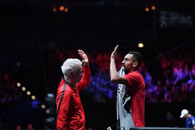 Team World captain John McEnroe tried to raise Nick Kyrgios' spirits in his match against the home town favorite. Credit: Ben Solomon/Laver Cup