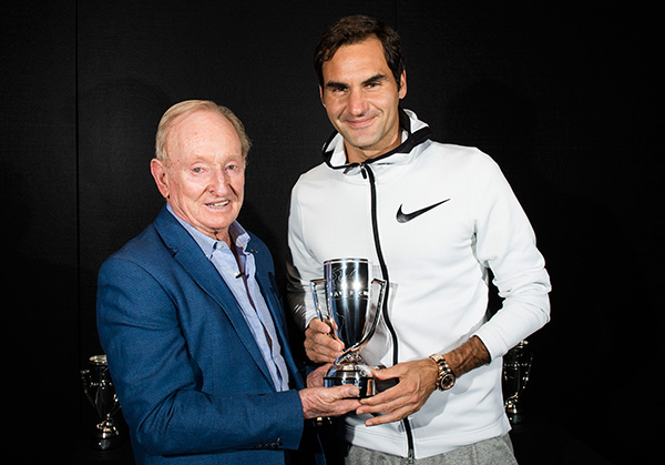 Roger Federer receives a replica of the Laver Cup trophy, presented by Rod Laver to all Team Europe players and captains during the Australian Open. Credit: Ben Solomon. 