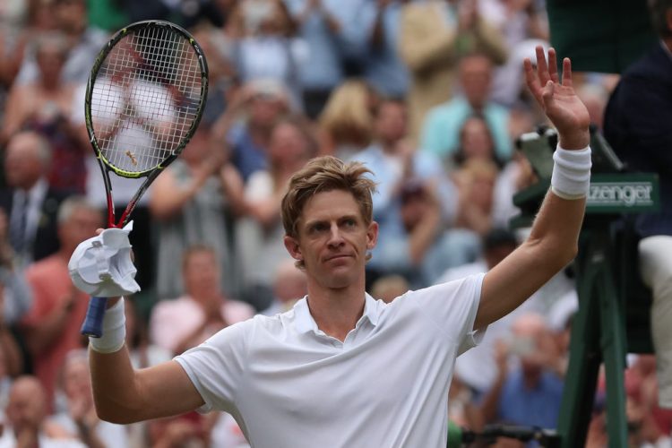 South Africa's Kevin Anderson reacts after winning against US player John Isner during the final set tie-break of their men's singles semi-final match on the eleventh day of the 2018 Wimbledon Championships at The All England Lawn Tennis Club in Wimbledon, southwest London, on July 13, 2018. - Anderson won the match 7-6, 6-7, 6-7, 6-4, 26-24. 