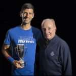 Laver Cup trophy presentation to Novak Djokovic, by Rod Laver. (Photo: Ben Solomon/Laver Cup).