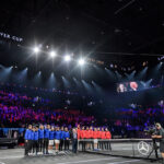 Team Europe and Team World stand tall with Rod Laver at the Opening Ceremony