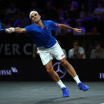Roger Federer stretches for a forehand against Nick Kyrgios