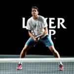 Canadian Milos Raonic hits on center court