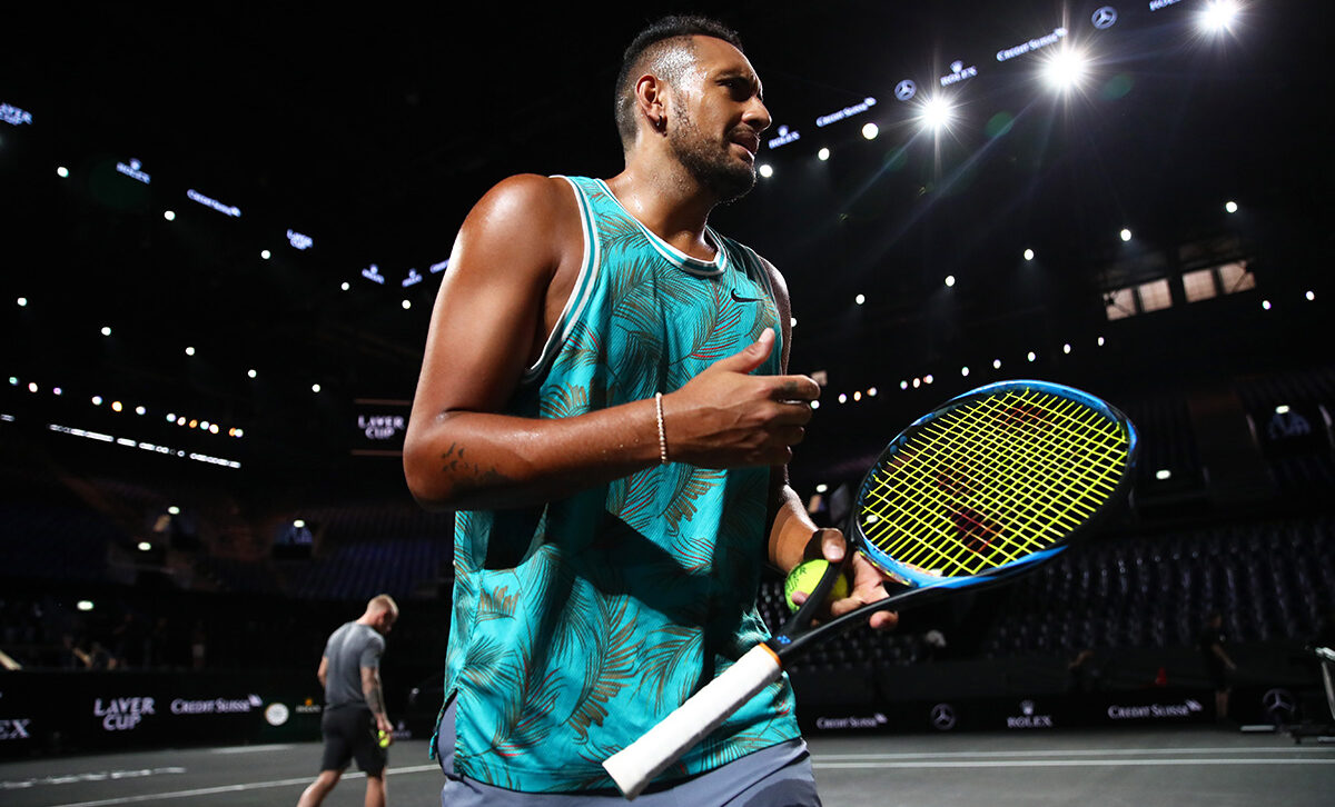 Nick Kyrgios practices on center court
