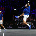 Roger Federer, playing partner of Alexander Zverev of Team Europe plays a smash during their doubles match against Jack Sock and Denis Shapovalov