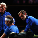Roger Federer coaches Rafael Nadal while Team Europe captain Bjorn Borg looks on