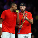 Nick Kyrgios has a word with Jack Sock during the doubles