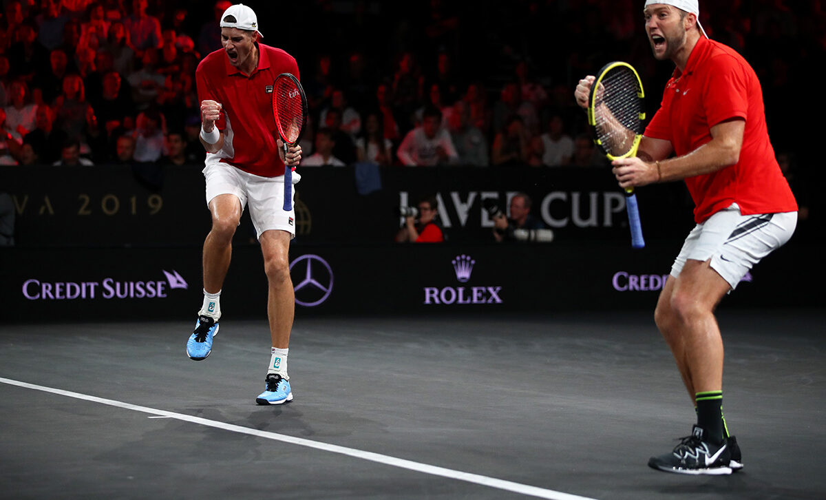 John Isner and Jack Sock celebrate victory over Roger Federer and Stefanos Tsitsipas in Sunday's doubles