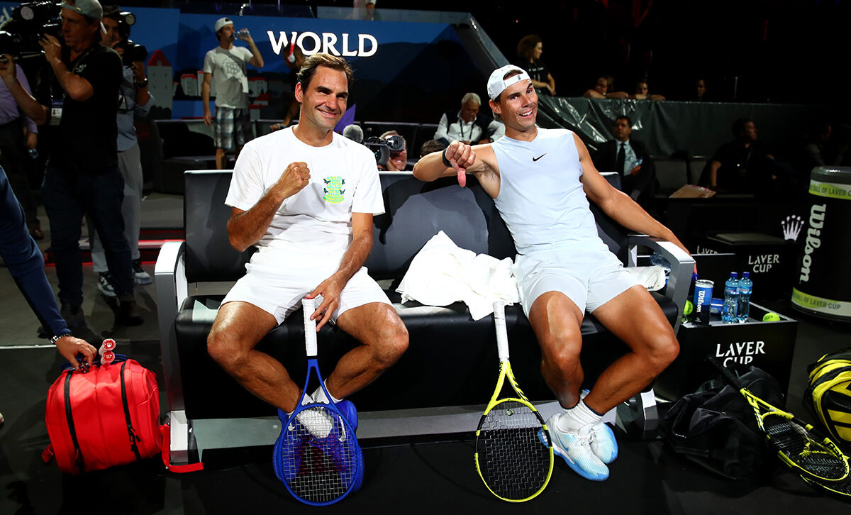 Friends unite: Rafael Nadal and Roger Federer enjoy a joke during practice