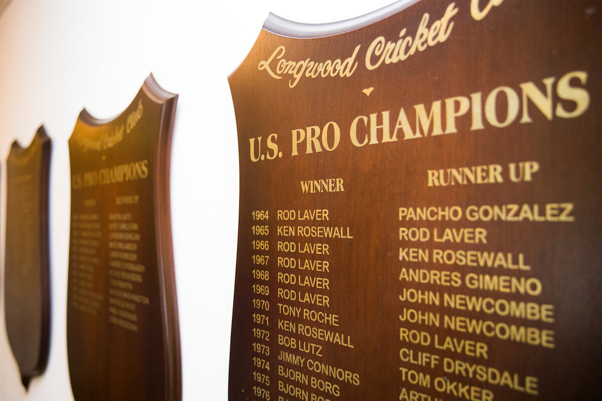 A detailed view of the US Pro Championship plaque listing Rod Laver as a repeat winner at the Longwood Cricket Club.