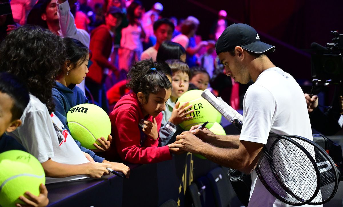 Team World’s Francisco Cerundolo signs autographs at Open Practice Day. Photo by Ben Solomon.