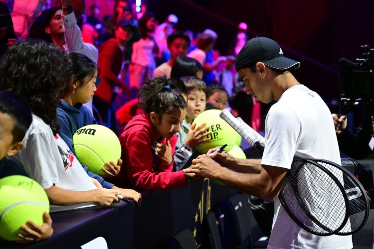 Team World’s Francisco Cerundolo signs autographs at Open Practice Day. Photo by Ben Solomon.