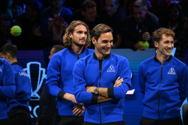 Roger Federer enjoys the action from Team Europe's bench during Laver Cup London 2022