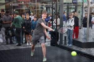 Testing out tennis skills at the Laver Cup Fan ZOne. Photo by Gerald Matzka/Getty Images for Laver Cup