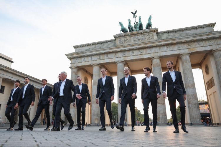 A pack of champions. Team Europe walk across the cobblestones in front of Brandenburg Gate. Photo by Maja Hitij/Getty Images