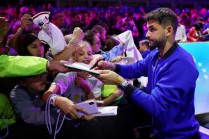 Grigor Dimitrov signs autographs at Open Practice Day. Photo by Maja Hitij/Getty Images