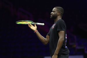 Frances Tiafoe twirls his racket during Team World's first practice. Photo by Maja Hitij/Getty Images