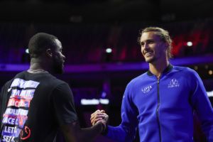 Frances Tiafoe greets Alexander Zverev at Uber Arena. Photo by Maja Hitij/Getty Images