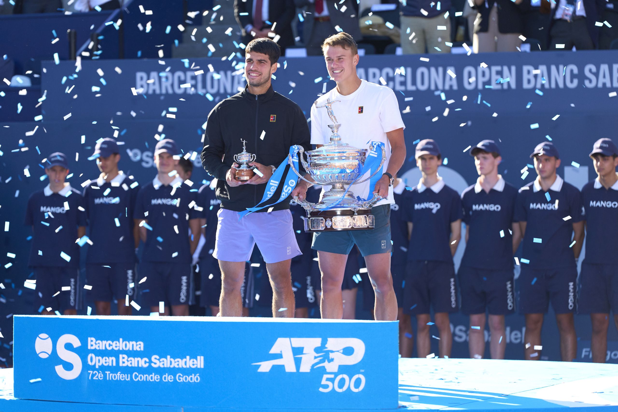 Holger Rune and teammate Carlos Alcaraz continued their rivalry at the Barcelona Open in 2025. 