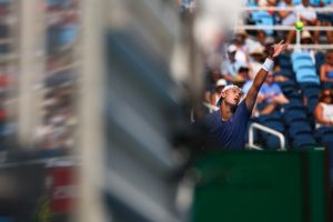 Team Europe's Holger Rune reaches deep for a punishing serve.
