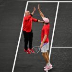 A high five moment between Captain Agassi and Opelka.
