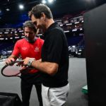 Pat Rafter and Roger Federer check out the equipment. Photo: Ben Solomon/Laver Cup