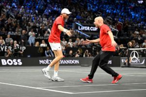 Team World's spirits lift as Alex Michelsen takes his match into a Laver Breaker.