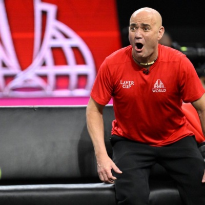 Captain Agassi, on the edge of his seat.