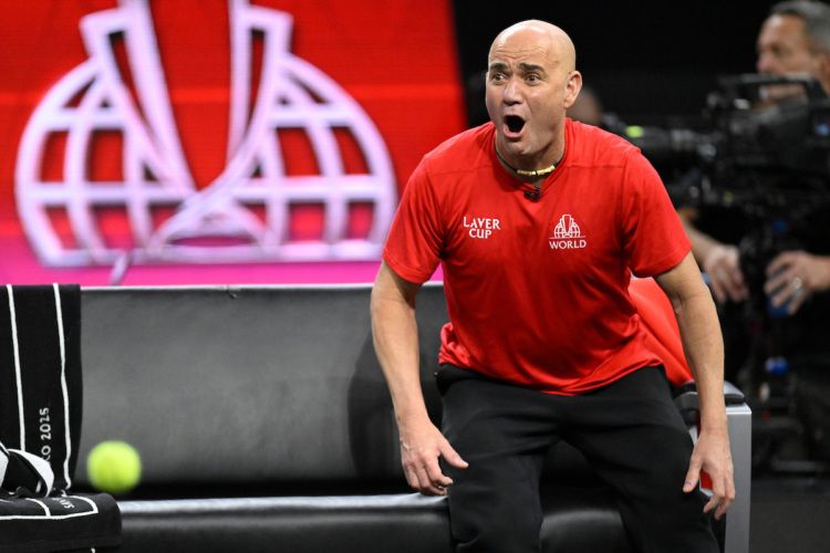 Captain Agassi, on the edge of his seat.