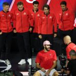 Team World Captain Andre Agassi advises Reilly Opelka during his match against Casper Ruud.