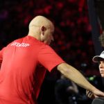 Andre Agassi has a word with Alex Michelsen on Day 1.