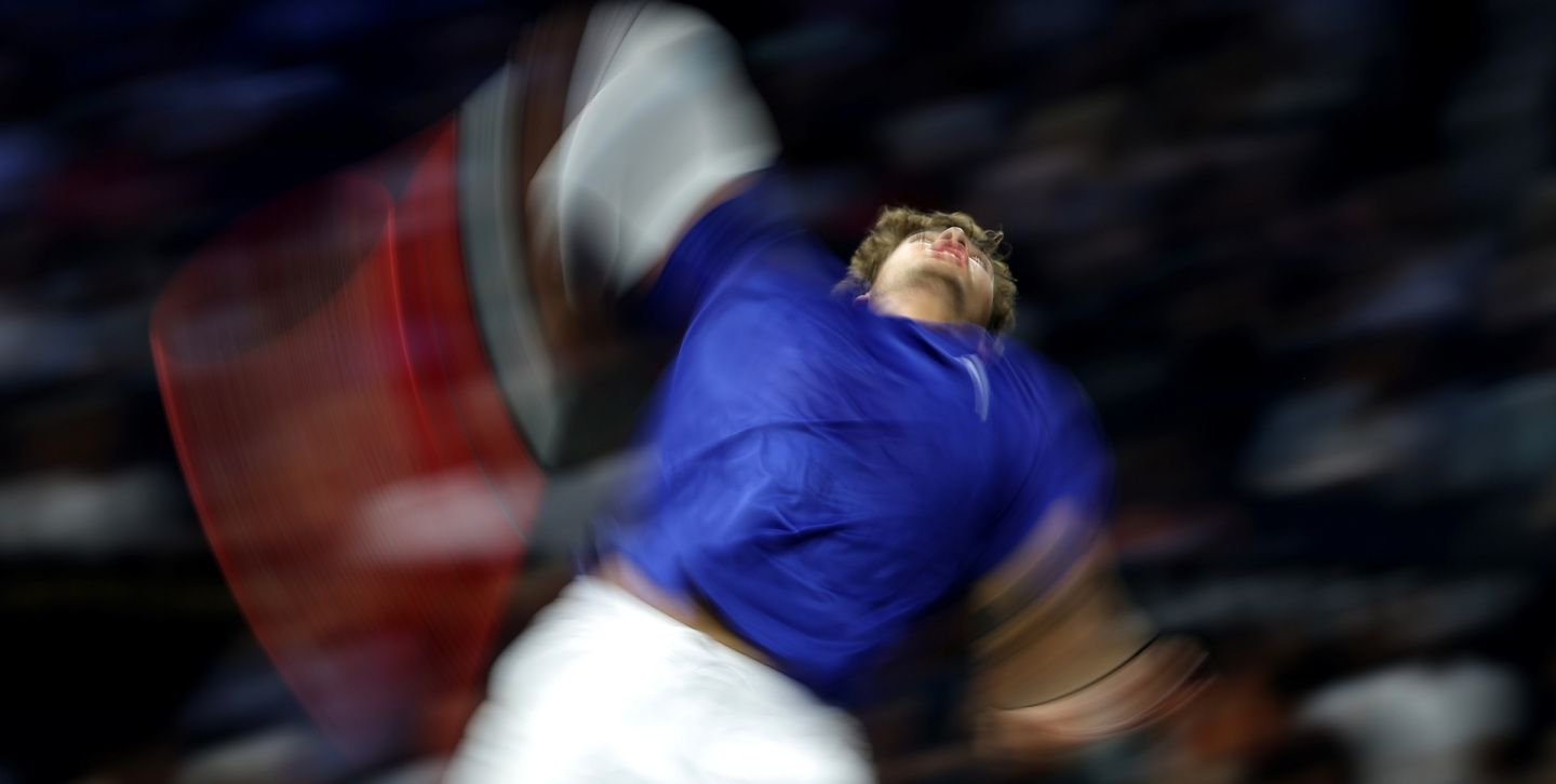 Flavio Cobolli winds up for Team Europe.