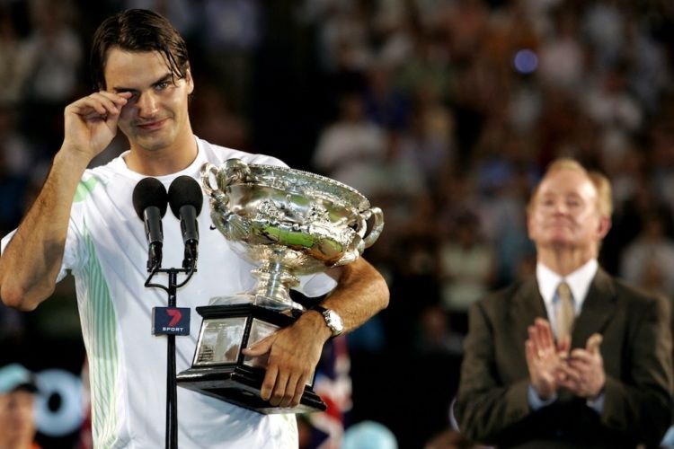 Roger Federer won his seventh Grand Slam title at Australian Open 2006, coming from a set down to beat unseeded Cyprus' Marcos Baghdatis. Rod Laver looks on during an emotional presentation ceremony. 
