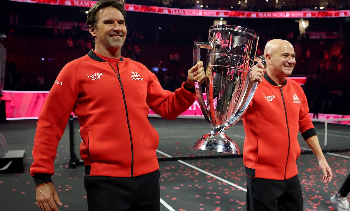 SAN FRANCISCO, CALIFORNIA - SEPTEMBER 21: (L-R) Team World Vice Captain Patrick Rafter and Team World Captain Andre Agassi walk with the Laver Cup Trophy after defeating Team Europe during day three of Laver Cup 2025 at Chase Center on September 21, 2025 in San Francisco, California. (Photo by Ezra Shaw/Getty Images for Laver Cup) Laver Cup 2025 – Day 3
