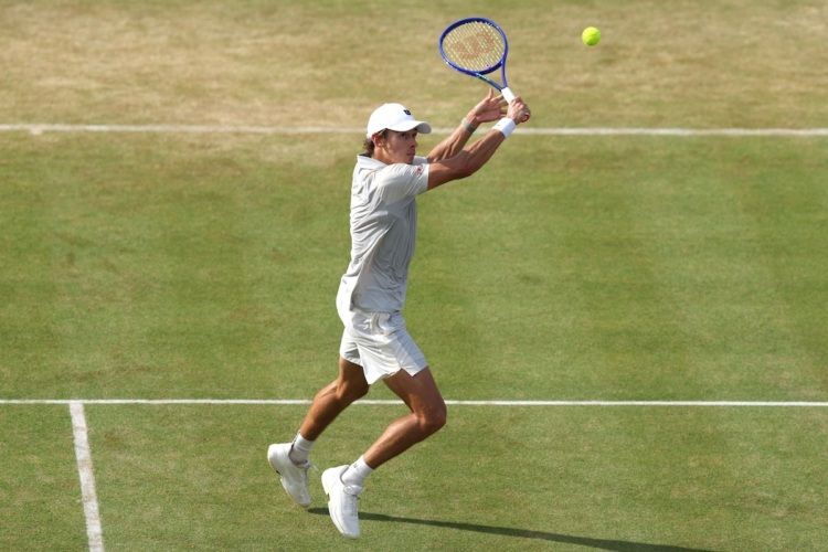 Top seed Alex de Minaur in action at Queen's.