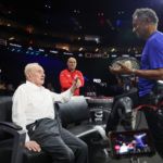 Rod Laver chats to Team Europe captain Yannick Noah, while Team World captain Andre Agassi listens in.
