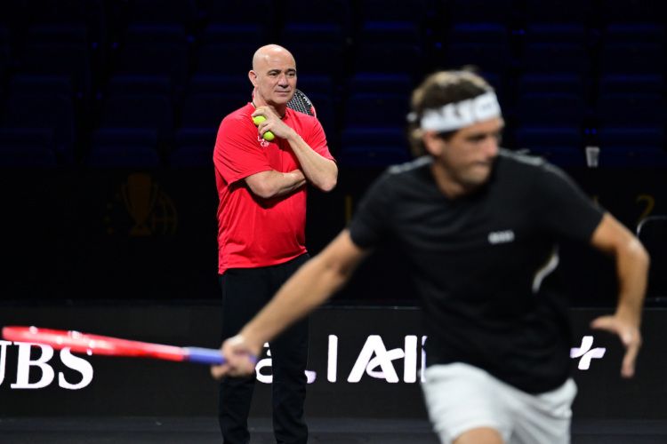 Andre Agassi watches one of his leading players, Taylor Fritz, practice for Laver Cup 2026.