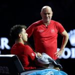 Team World captain Andre Agassi supports Francisco Cerundolo.