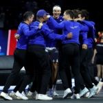 Team Europe players and captains get around Zverev.