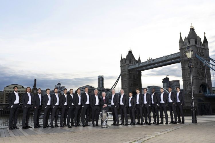 The players from Team Europe and Team World along with Rod Laver pose for a photograph with the trophy in-front of Tower Bridge ahead of the Laver Cup in London, England. Photo by Clive Brunskill/Getty Images