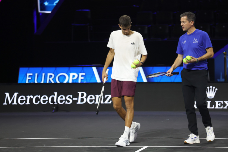 Rafael Jodar spends time on court with Team Europe vice-captain Tim Henman.